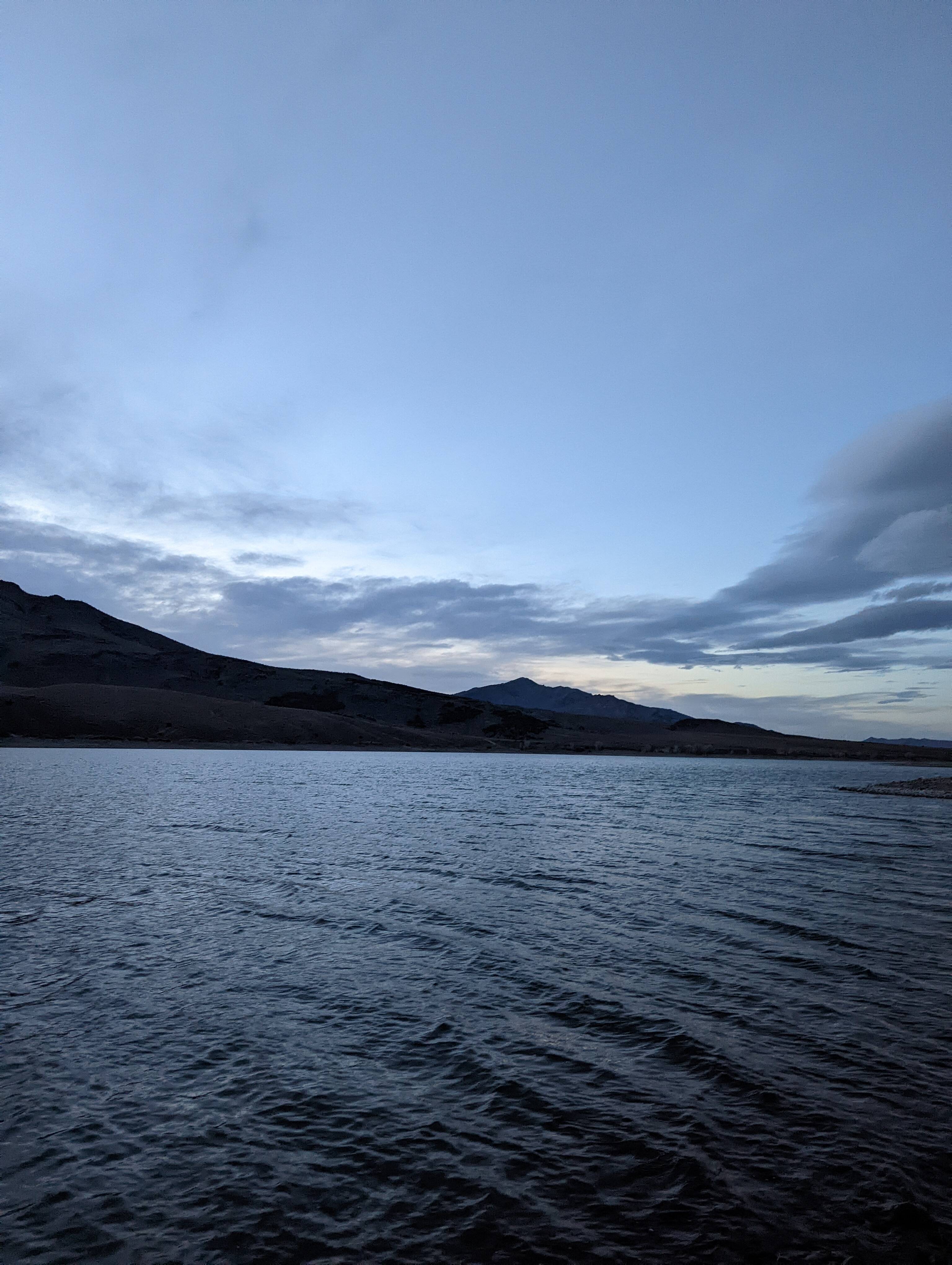 lake and mountains in fading light
